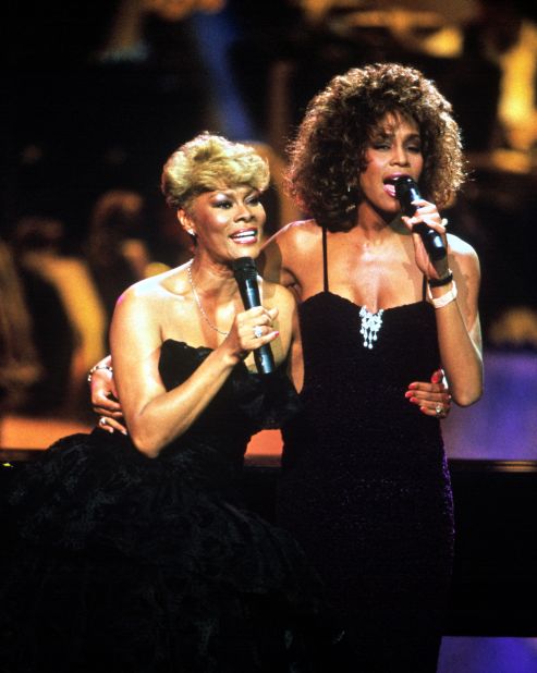 Warwick and Whitney Houston perform Warwick's hit song "That's What Friends Are For" during Arista Records' 15th anniversary concert in 1990. Warwick and Houston were first cousins, both coming from prolific musical families.