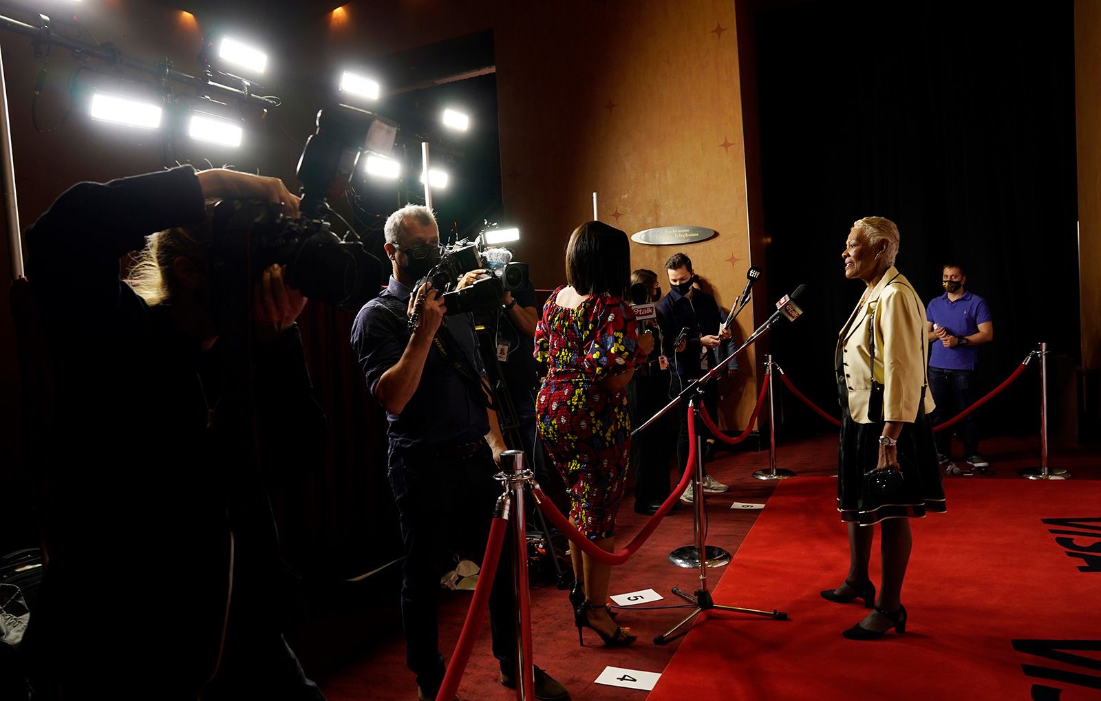 Warwick speaks to the media at the Toronto International Film Festival in September 2021.