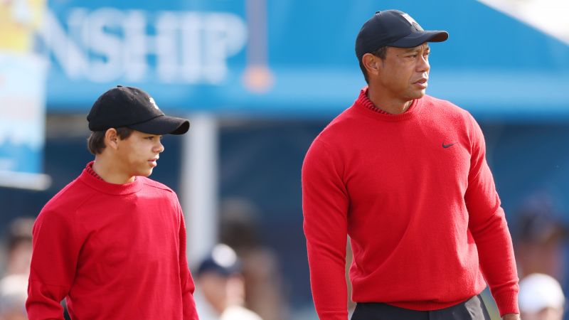 Seeing double: Tiger Woods and son Charlie tee off in perfect symmetry wearing famous Sunday red | CNN