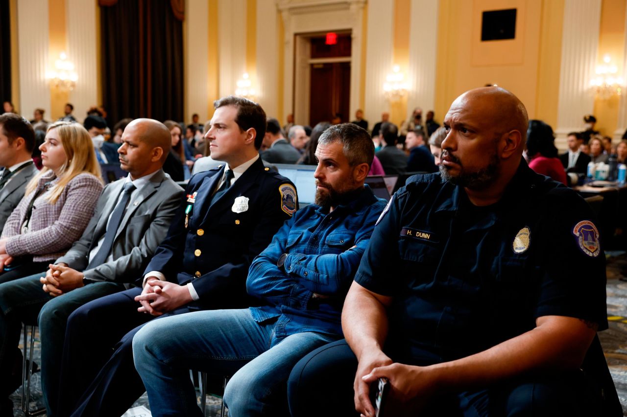 Men who defended the US Capitol on January 6, 2021, attend Monday's public meeting. From right ar Capitol Police Officer Harry Dunn, former Metropolitan Police Department officer Michael Fanone, Metropolitan Police Department officer Daniel Hodges and Capitol Police Sgt. Aquilino Gonell.