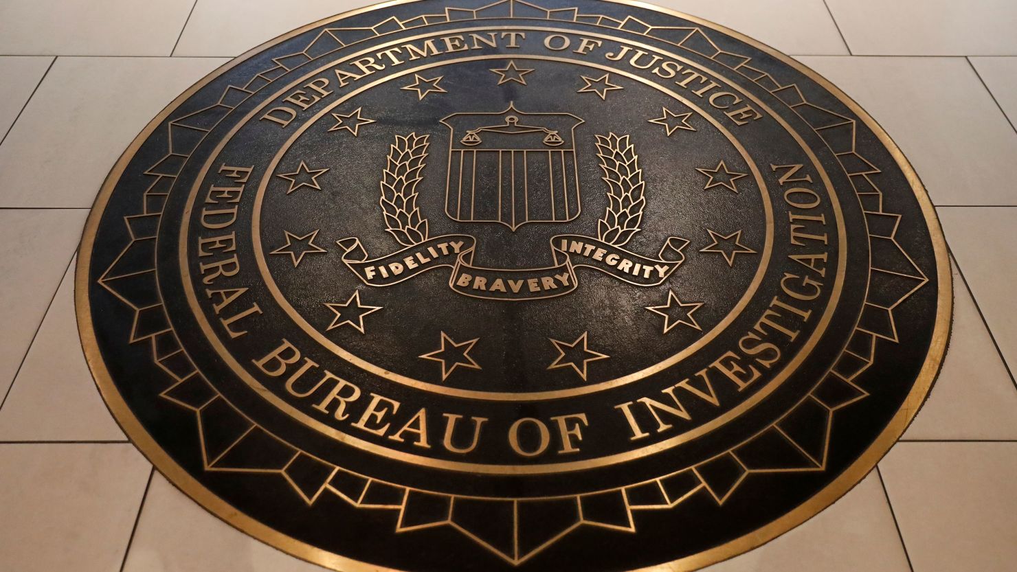 The Federal Bureau of Investigation seal is seen at FBI headquarters in Washington, June 14, 2018.