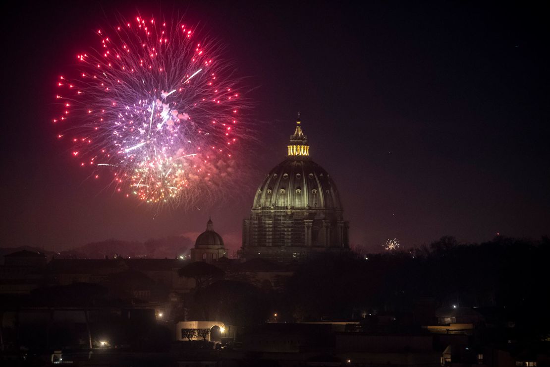 ROME, ITALY - JANUARY 01: Fireworks are seen over St. Peter's Basilica on New Year's Eve during the Coronavirus pandemic on January 01, 2021, in Rome, Italy. The Italian government continues to enforce the national lockdown measures to control the spread of COVID-19 in the final days of 2020. New Year's Eve celebratory fireworks have been cancelled in most cities worldwide or broadcasted online in a bid to curb the spread of Covid-19 infections. (Photo by Antonio Masiello/Getty Images)