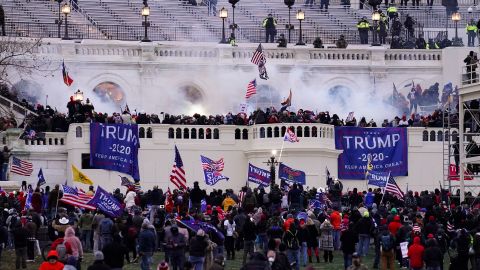 FILE - Violent rioters, loyal to President Donald Trump, storm the Capitol in Washington, Jan. 6, 2021. 
