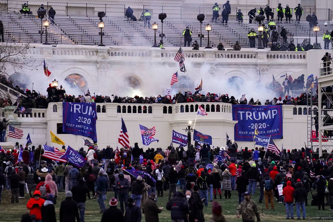 FILE - Violent rioters, loyal to President Donald Trump, storm the Capitol in Washington, Jan. 6, 2021. 