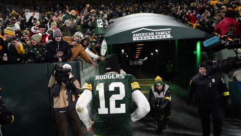 Rodgers walks off the field after the win over the Rams.