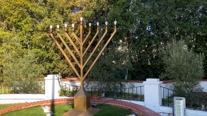 Man arrested for allegedly vandalizing menorah with a Nazi symbol in California | CNN