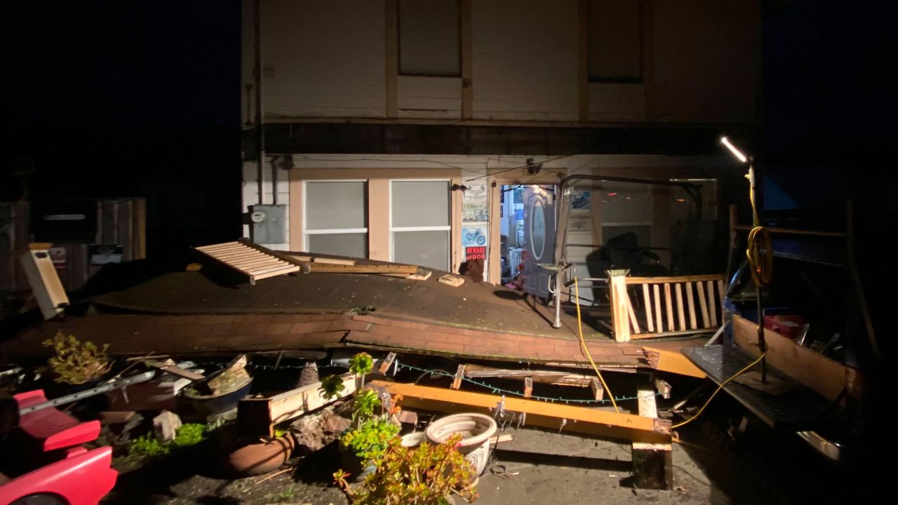 Earthquake damage is seen outside a building in Rio Dell, California, on Tuesday.