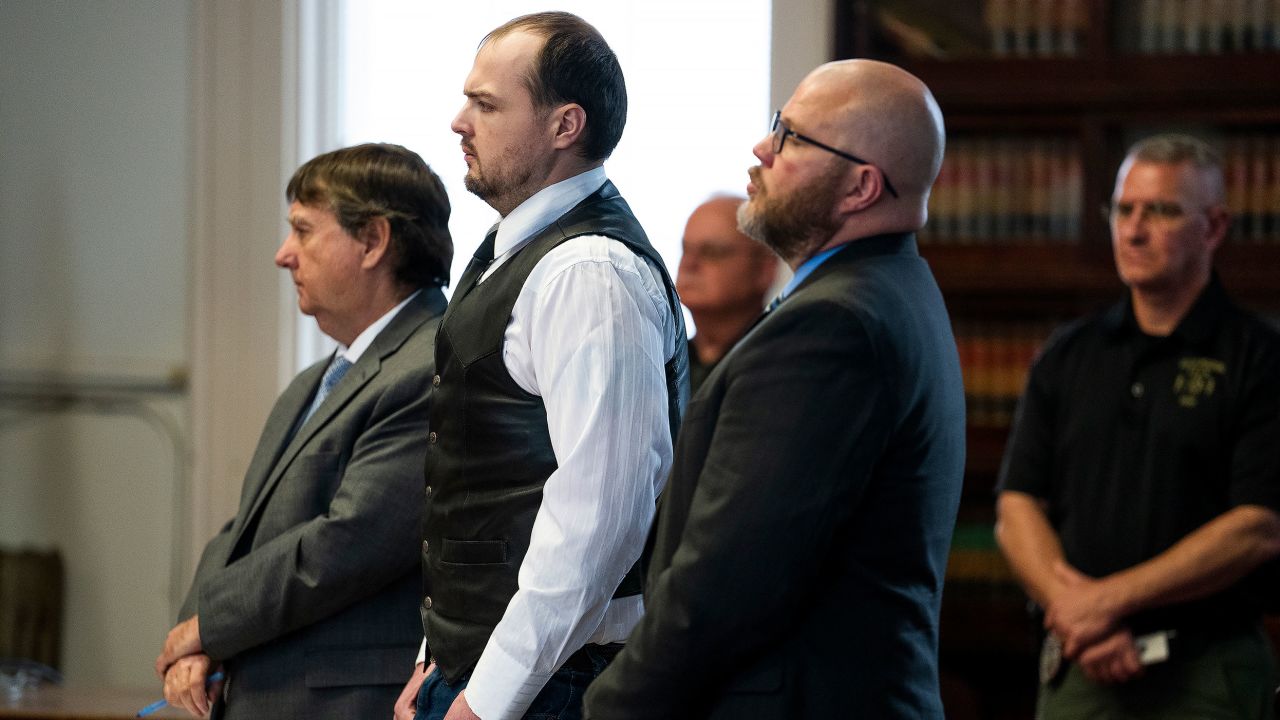 George Wagner IV, center, stands next to attorneys John P. Parker and Richard M. Nash as he receives his sentence from Judge Randy Deering at a hearing Monday in Waverly, Ohio.
