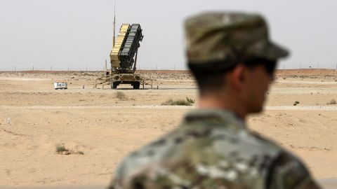 In this February 20, 2020 file photo, members of the United States Air Force stand near a Patriot missile battery at Prince Sultan Air Force Base in Al Hajj, Saudi Arabia.