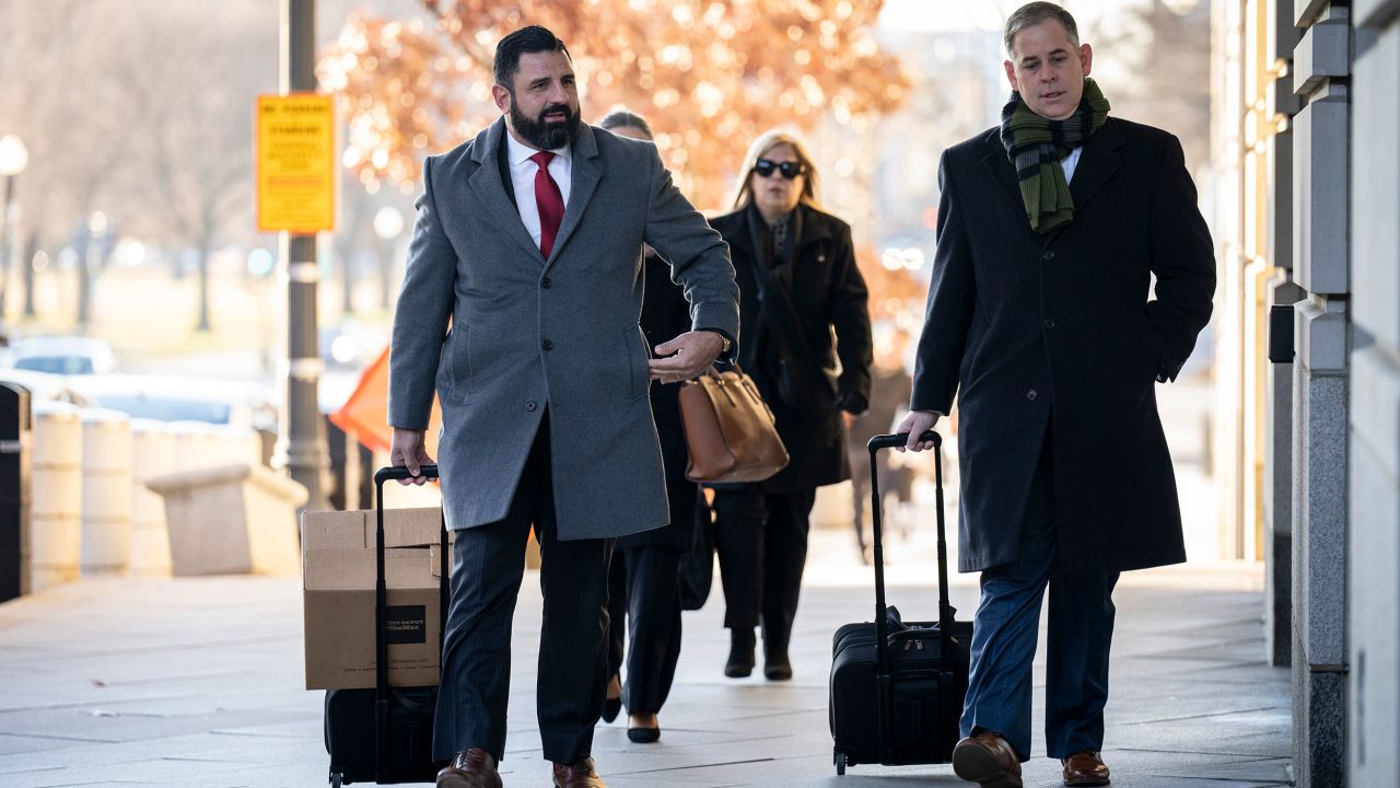 WASHINGTON, DC - DECEMBER 19: Nayib Hassan, attorney for Enrique Tarrio (L) arrives at the E. Barrett Prettyman U.S. District Courthouse on December 19, 2022 in Washington, DC. The trial begins Monday for Proud Boys leaders charged with seditious conspiracy in connection with the January 6 attack on the U.S. Capitol. 
