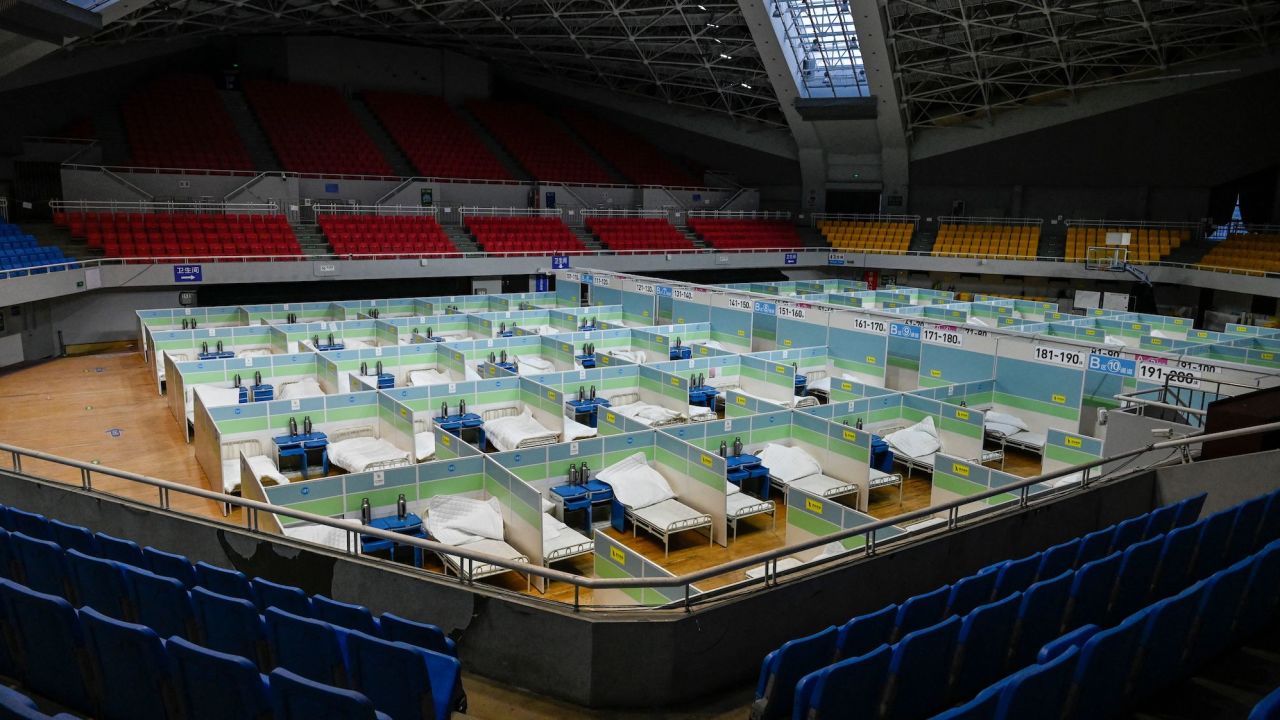 Beds in partitioned rooms at a makeshift fever clinic, converted from a stadium, in Beijing, on December 20.