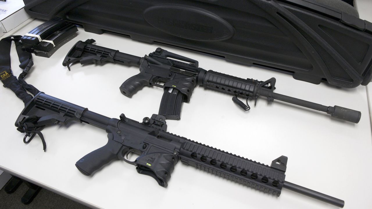 A Bushmaster semi-automatic assault rifle (top) and a Smith & Wesson semi-automatic rifle are turned in during a gun buyback event at the New Haven Police Academy in New Haven, Connecticut, December 22, 2012,