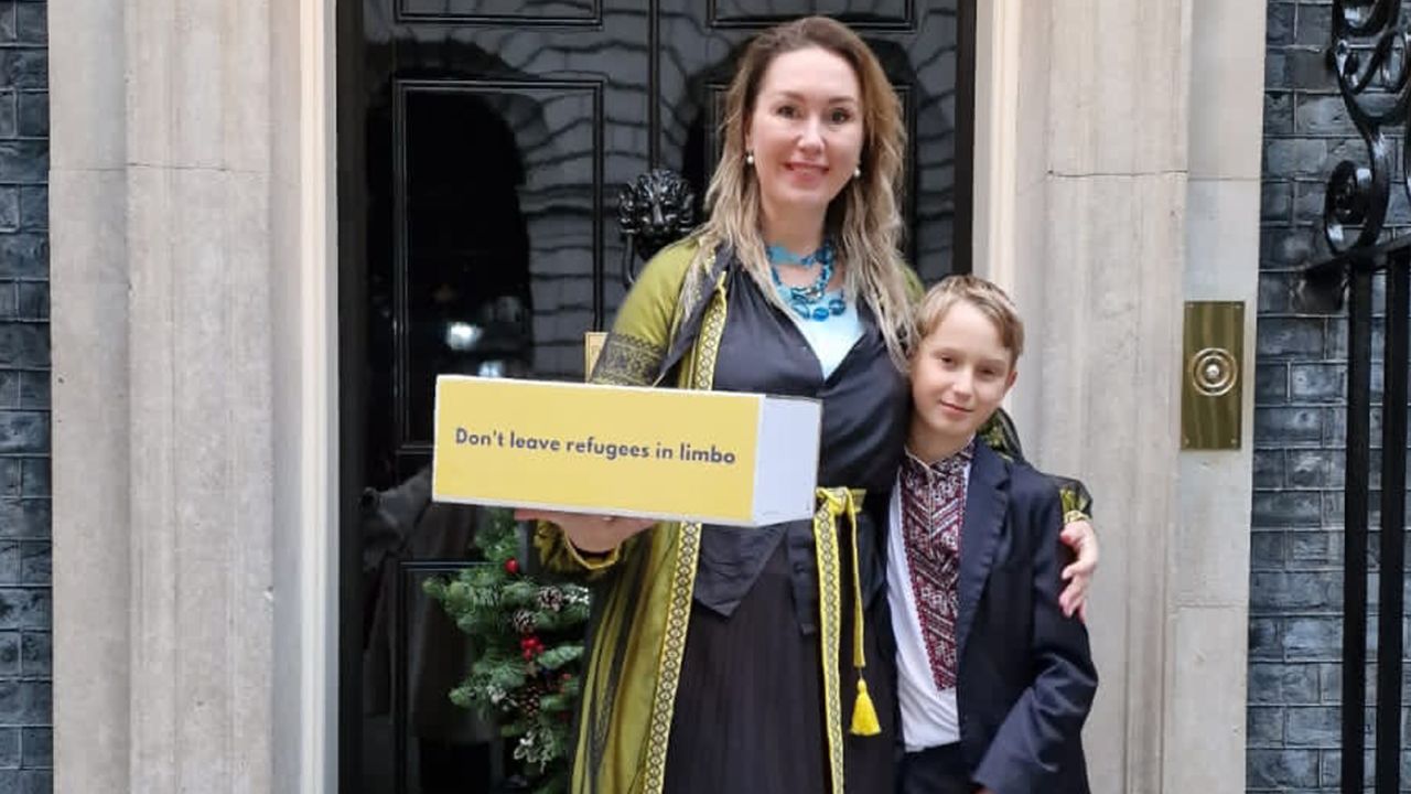Tania Orlova and her son, Danylo, delivering a petition to 10 Downing Street, asking for more support for Ukrainian refugees in the UK.