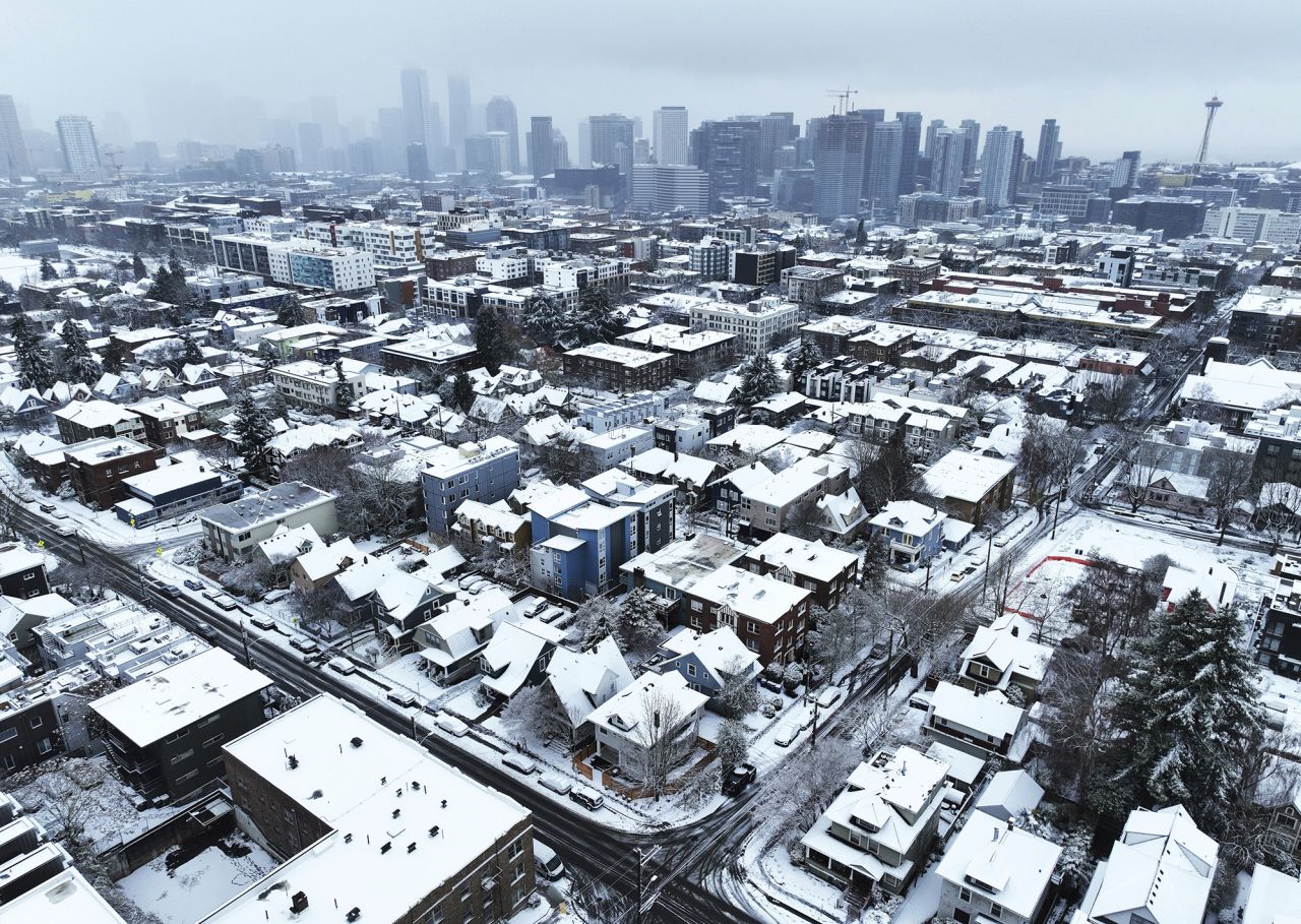 Snow covers homes in Seattle on December 20. 