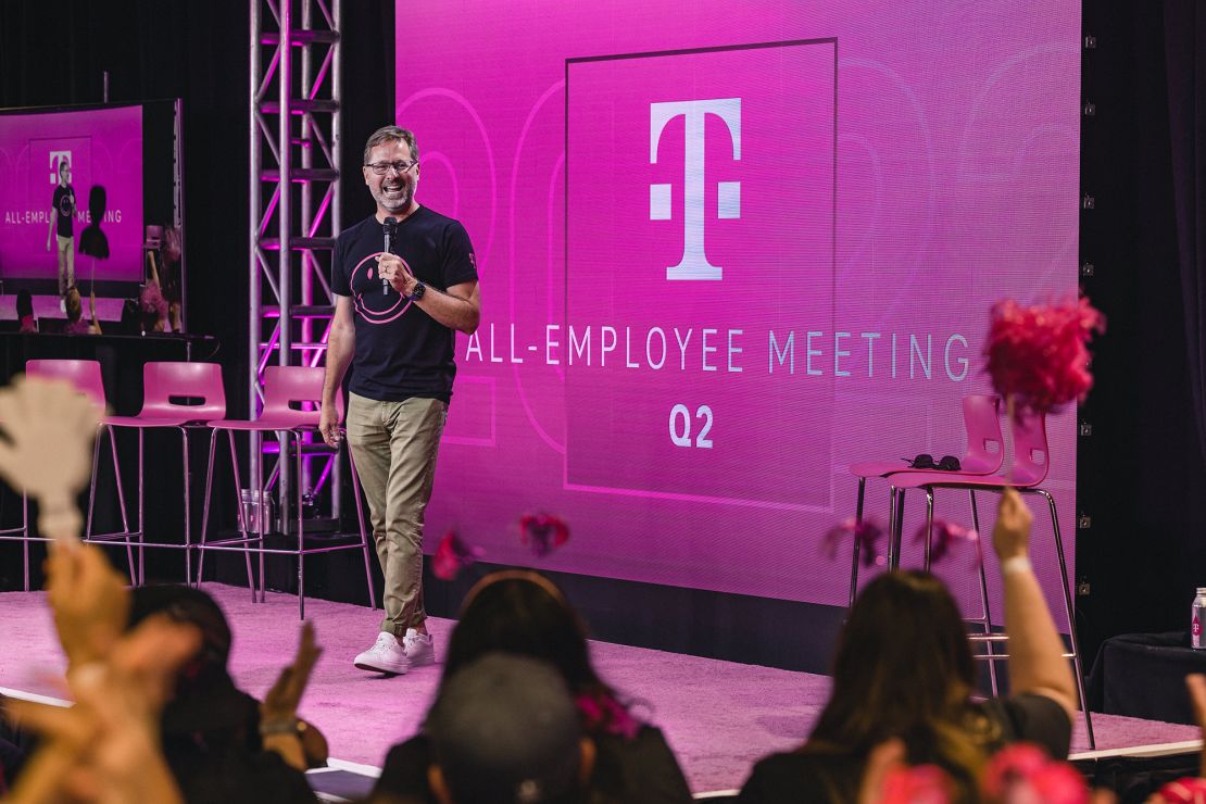 T-Mobile CEO Mike Sievert talks to employees at a 2022 company event.