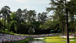 AUGUSTA, GEORGIA - APRIL 13: A general view as Tiger Woods of the United States stands on the 16th green during the third round of the Masters at Augusta National Golf Club on April 13, 2019 in Augusta, Georgia. (Photo by Kevin C. Cox/Getty Images)