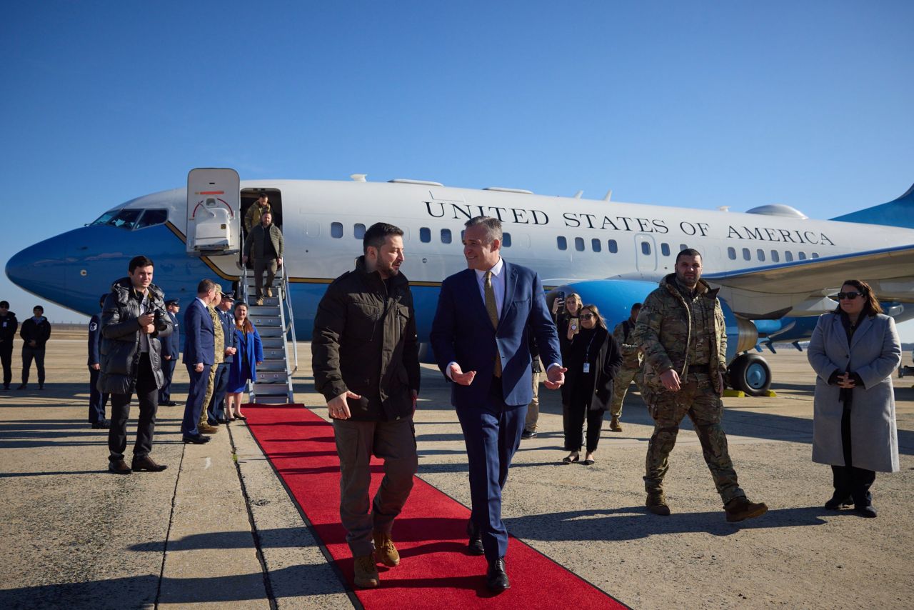 Zelensky, left, is greeted by Rufus Gifford, chief of protocol for the state department, after landing in the United States on Wednesday.