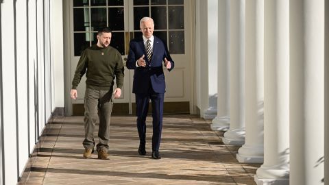 US President Joe Biden walks with Ukraine's President Volodymyr Zelensky through the colonnade of the White House, in Washington, DC on December 21, 2022. - Zelensky is in Washington to meet with US President Joe Biden and address Congress -- his first trip abroad since Russia invaded in February. (Photo by Brendan SMIALOWSKI / AFP) (Photo by BRENDAN SMIALOWSKI/AFP via Getty Images)