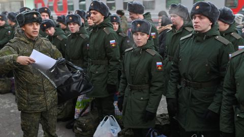 Russian conscripts line up before departure for garrisons at a railway station in Omsk, Russia last month.