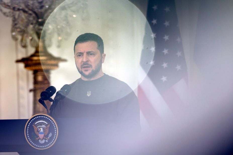 Zelensky speaks during a news conference with Biden in the East Room of the White House.