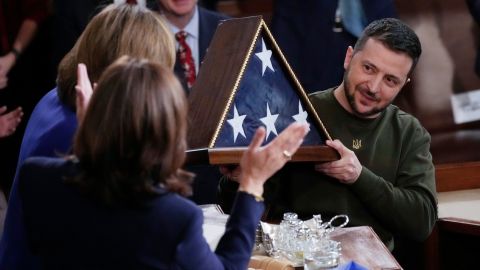 Ukrainian President Volodymyr Zelenskyy holds an American flag that was gifted to him by House Speaker Nancy Pelosi of Calif., after he addressed a joint meeting of Congress on Capitol Hill in Washington, Wednesday, Dec. 21, 2022. (AP Photo/J. Scott Applewhite)