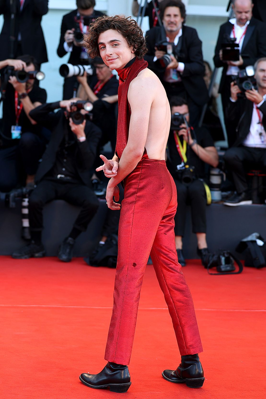 Chalamet caused a stir in his backless Haider Ackermann suit at  the "Bones And All" during the Venice Film Festival.