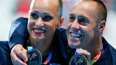 Christina Jones and Bill May of the US pose with their gold medals after the synchronised swimming mixed duet technical final at the Aquatics World Championships in Kazan, Russia, in June 2015. 