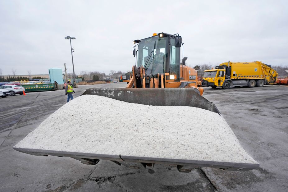 Salt is prepared to be loaded onto a truck at the Department of Public Works sanitation yard in Milwaukee on December 21.