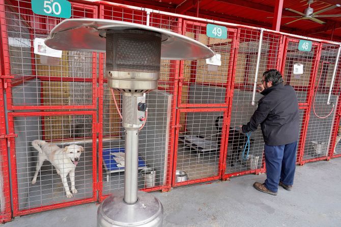 Propane heaters sit next to pens at the City of Mission Animal Shelter in Mission, Texas, on December 21.