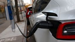 An electric vehicle is seen charging in Manhattan, New York, U.S., December 7, 2021. 