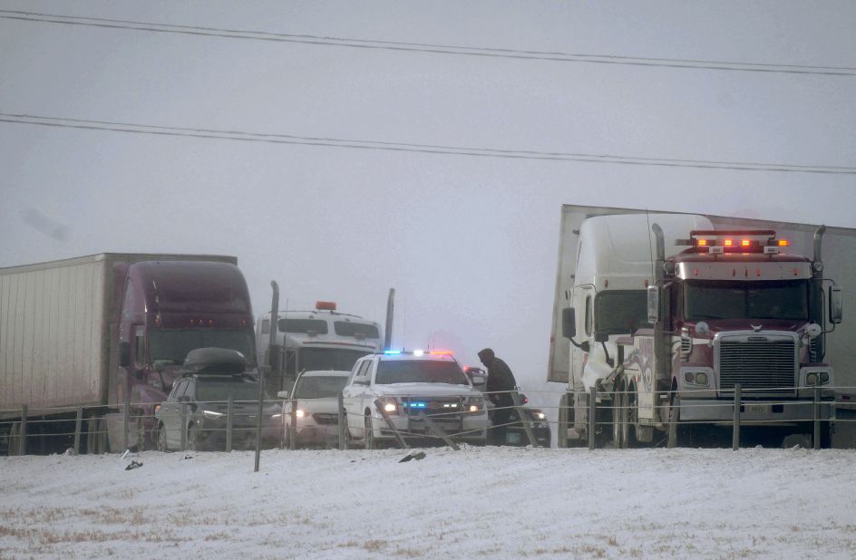 An accident involving a semi-tractor-trailer blocks the eastbound lanes of Interstate 80 in West Des Moines on December 22.