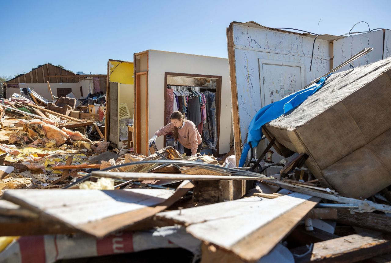 Korey Miller looks for valuables and family heirlooms in her grandmother's destroyed home in Gretna, Louisiana, on Thursday, December 15. <a href="https://www.cnn.com/2022/12/14/us/nationwide-massive-storm-tornadoes-wednesday/index.html" target="_blank">Strong storms and tornadoes ripped through the state</a> leaving at least 3 people dead.