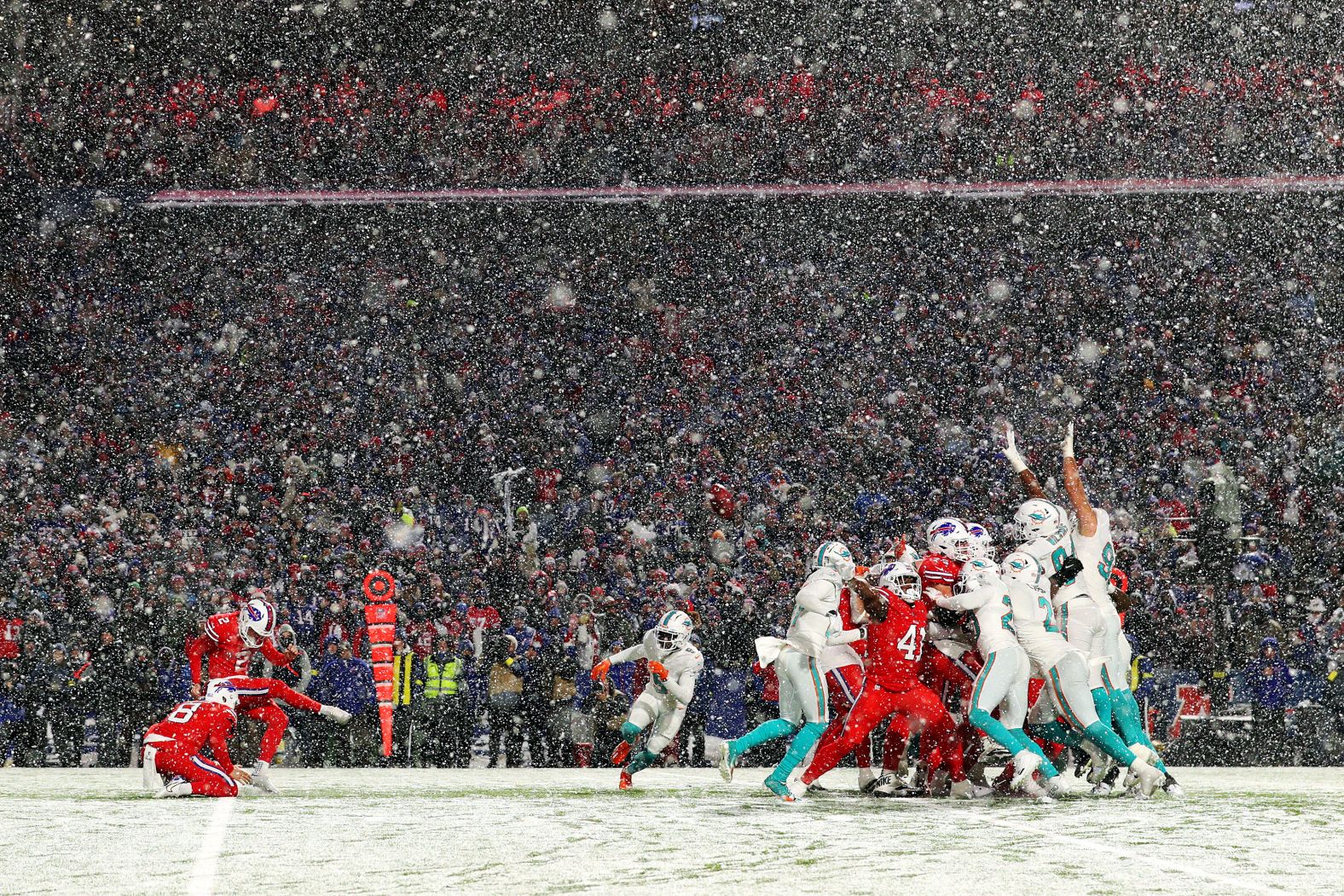 Tyler Bass of the Buffalo Bills kicks a game-winning field goal against the Miami Dolphins in Orchard Park, New York, on Saturday, December 17. The Bills surged past the Dolphins in the 4th quarter to overcome an eight-point deficit, winning 32-29.