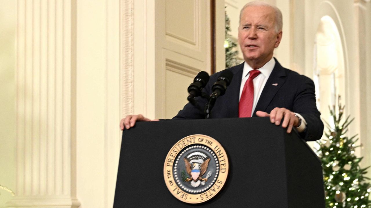 US President Joe Biden delivers a Christmas address from the Cross Hall of the White House in Washington, DC, on December 22, 2022. (Photo by Brendan SMIALOWSKI / AFP) (Photo by BRENDAN SMIALOWSKI/AFP via Getty Images)