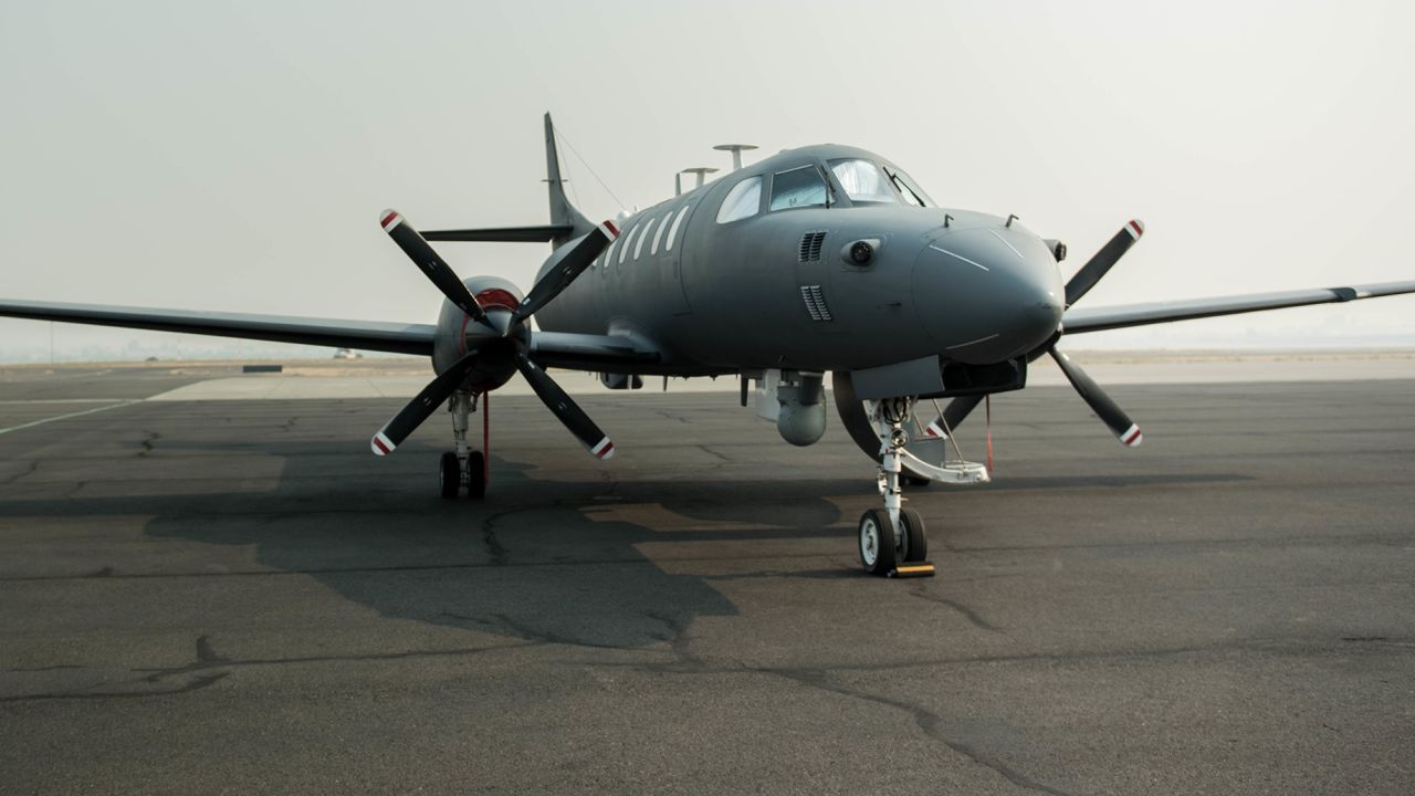 An RC-26 aircraft sits at the Medford airport in Oregon on September 2, 2017. 