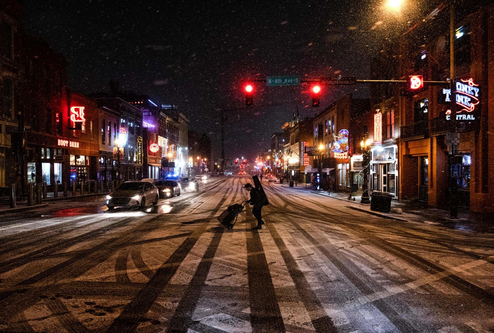 A musician departs following a show on Broadway in Nashville on December 22.