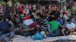 Ethnic Rohingya people gathered at the shelter after around 119 ethnic Rohingya were found by local fishermen who were landing on the beach in Krueng Geukueh waters, in North Aceh, on November 16, 2022, Aceh Province, Indonesia.