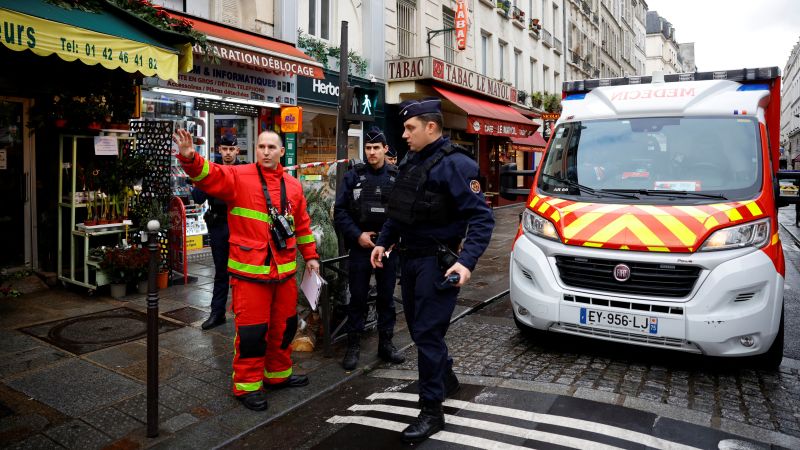 Police fire teargas to quell protesters at site of deadly Paris shooting | CNN