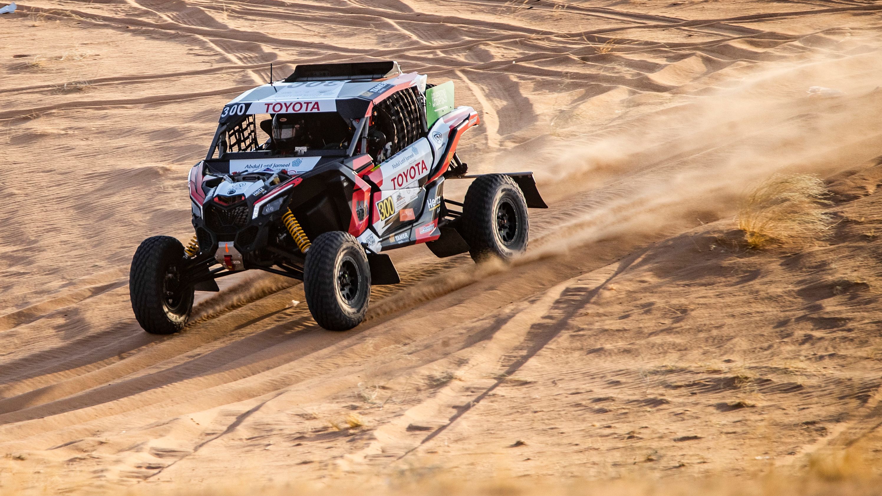Akeel drives a Can-Am UTV, designed to tackle the varied terrain of cross-country racing.