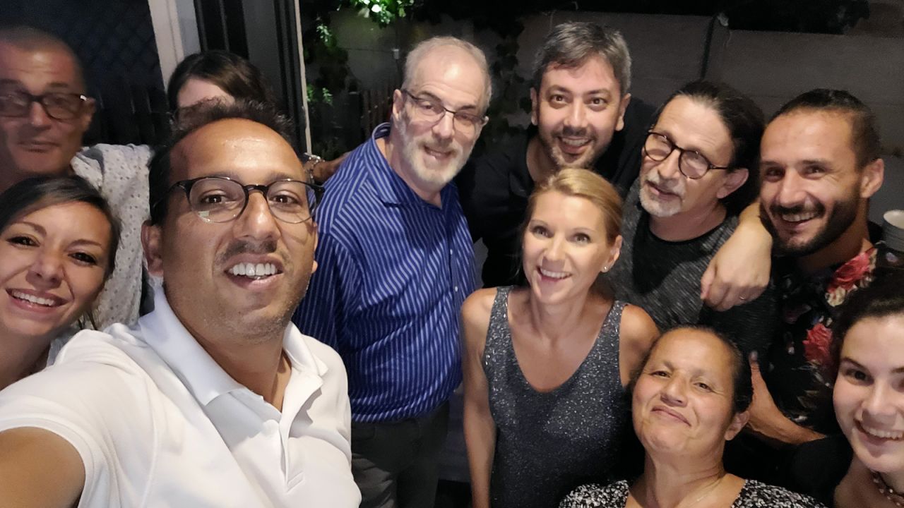 The author, center, with newfound family connections at a July 2022 party held in Paris in his honor.