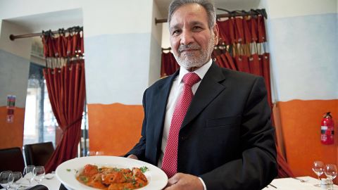 Ali Ahmed Aslam is said to have invented chicken tikka masala at his Glasgow restaurant in the 1970s. (Andy Buchanan/AFP/Getty Images)