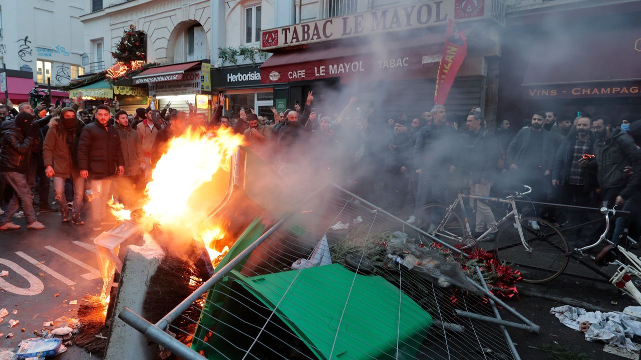 Police fired tear gas to disperse an increasingly agitated crowd in central Paris, soon after a gunman killed three Kurdish people during a shooting at a community center. 