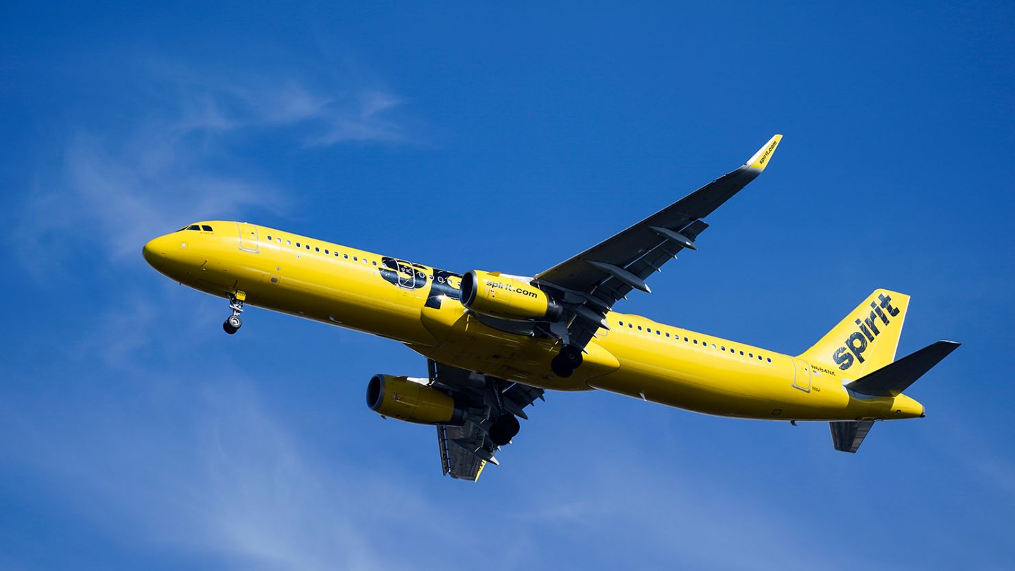 FILE - A Spirit Airlines jet approaches Philadelphia International Airport in Philadelphia, Feb. 24, 2021. Spirit Airlines is getting a chance to expand at Newark-Liberty International Airport, which is close to New York City. The U.S. Transportation Department announced Tuesday, July 5, 2022, that it will award Spirit rights to 16 takeoff and landing rights at Newark. (AP Photo/Matt Rourke, File)