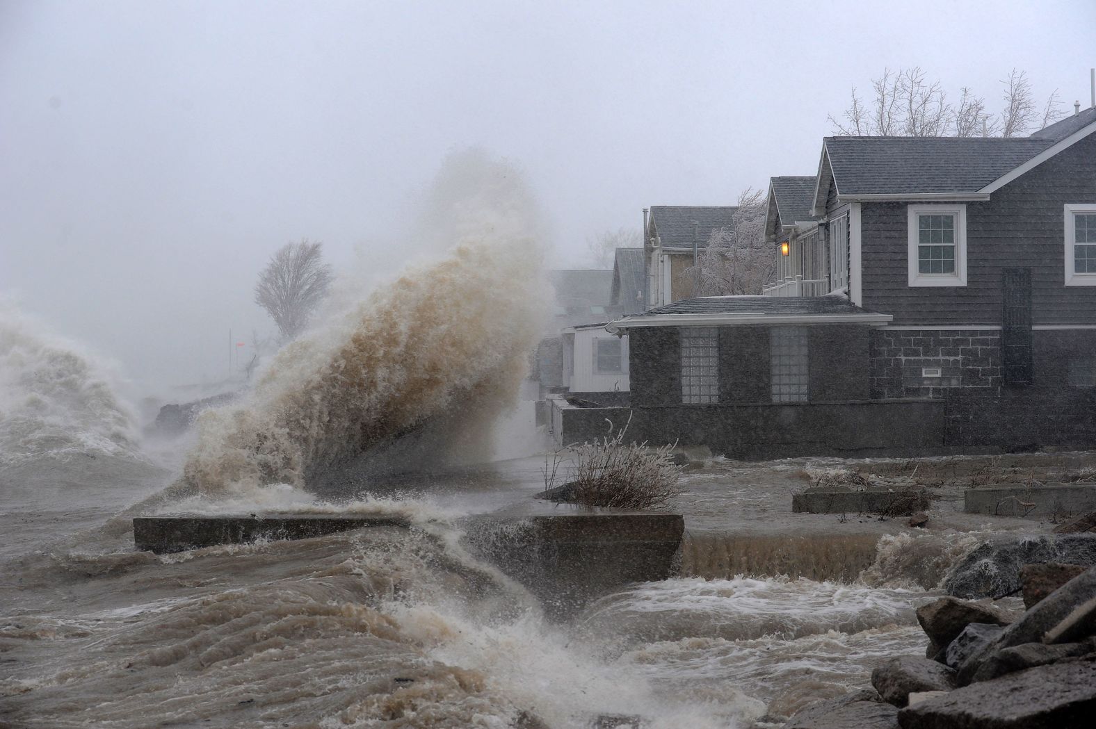 The waters of Lake Erie wash over the shoreline in Hamburg, New York, on December 23.