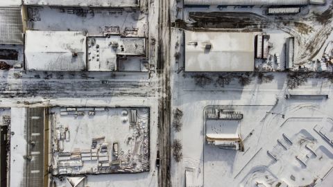 Buildings covered in snow are seen in below-freezing temperatures in Louisville, Kentucky, on Dec. 23.