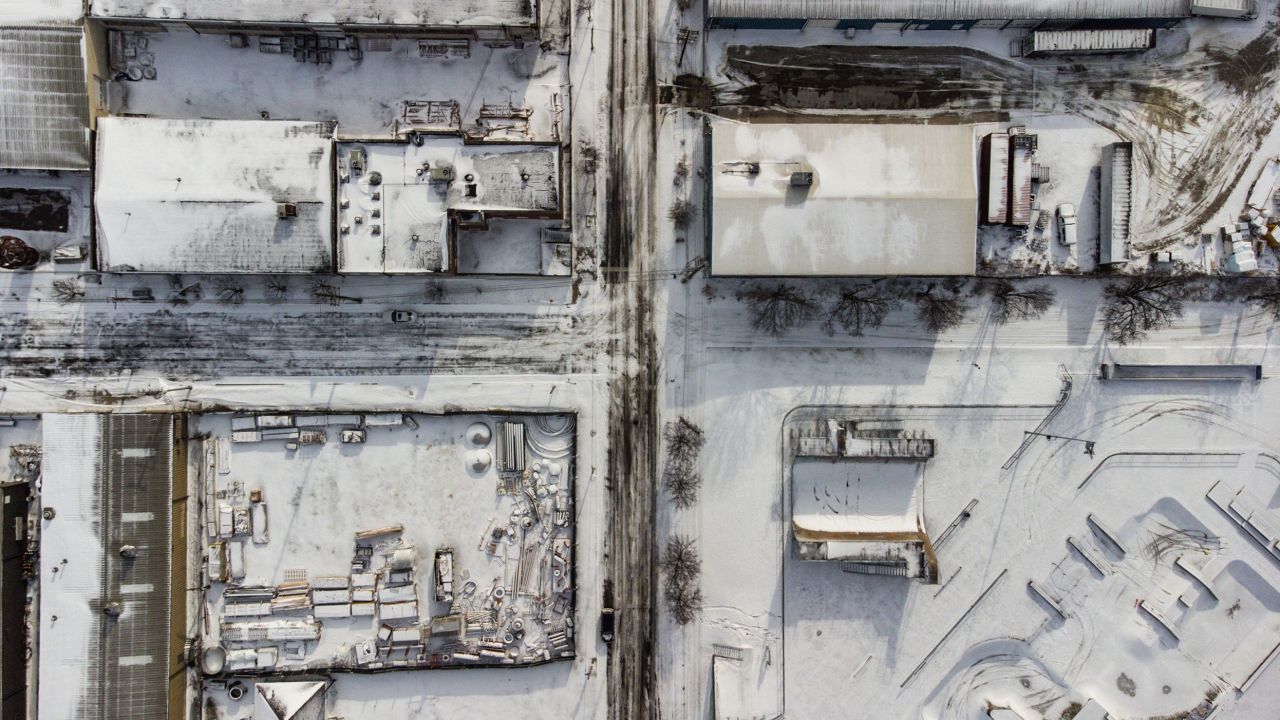 Snow-covered buildings are seen in Louisville, Kentucky, under freezing temperatures on December 23.