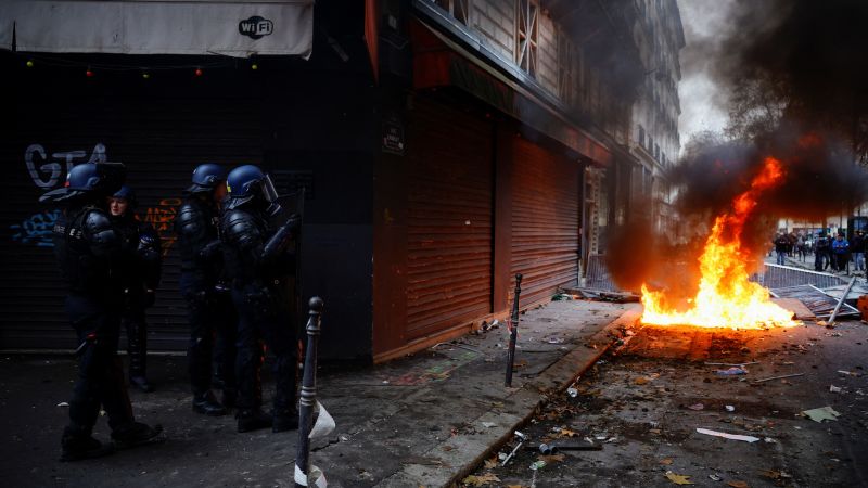 Police and protesters clash in Paris after fatal shooting at Kurdish community center | CNN