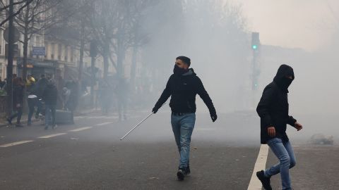 Paris: Police and protesters clash after fatal shooting at Kurdish  community center | CNN