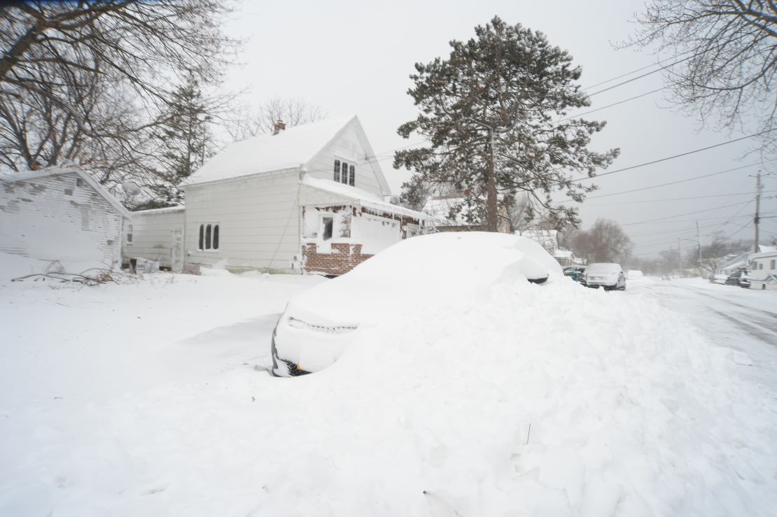 Snow covers a vehicle on December 24, 2022, in Hamburg, New York. 