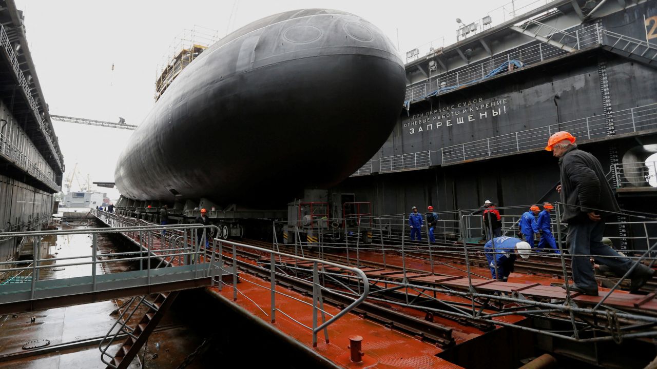 Workers attend a ceremony launching the diesel-electric submarine "Rostov-on-Don" at the Admiralty Shipyards in St. Petersburg in June 2014. 